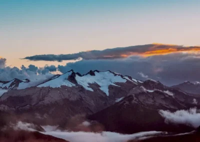 snow-covered mountains with beautiful sunset clouds